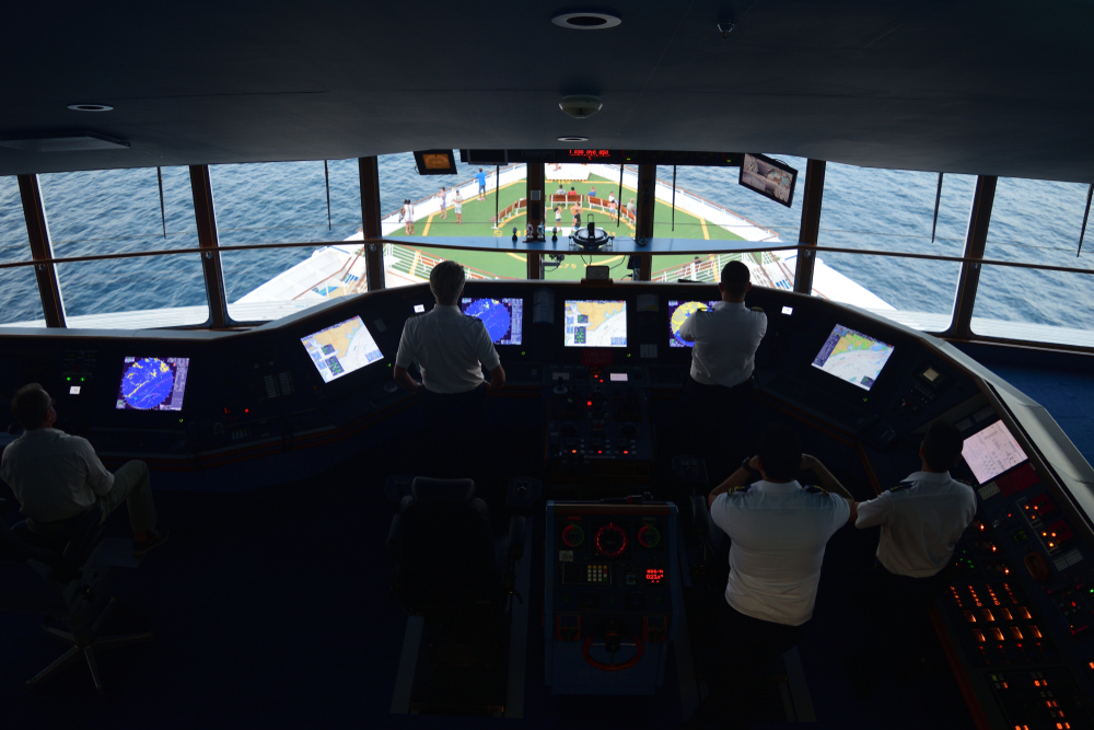 Captain,And,Crew,In,Cockpit,On,Cruise,Ship