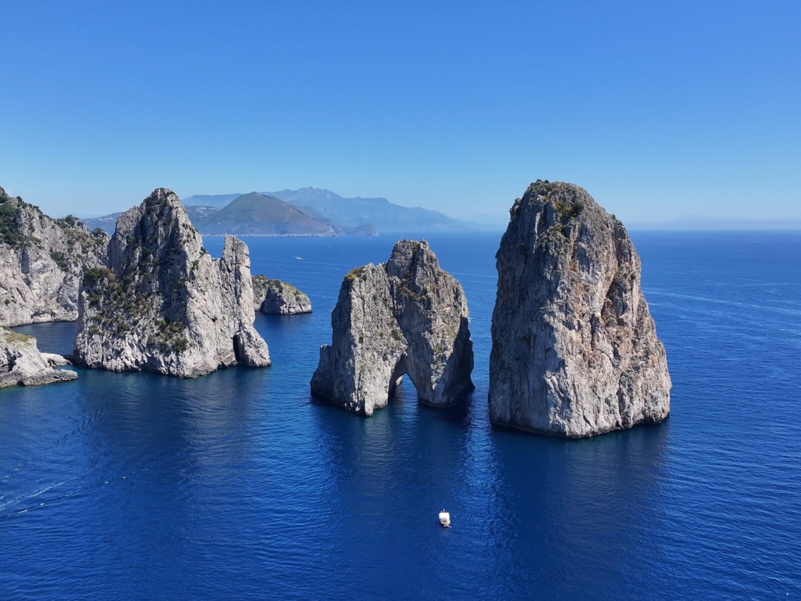 Faraglioni,Rocks,At,Capri,In,Naples,Italy.,Beach,Landscape.,Tourism