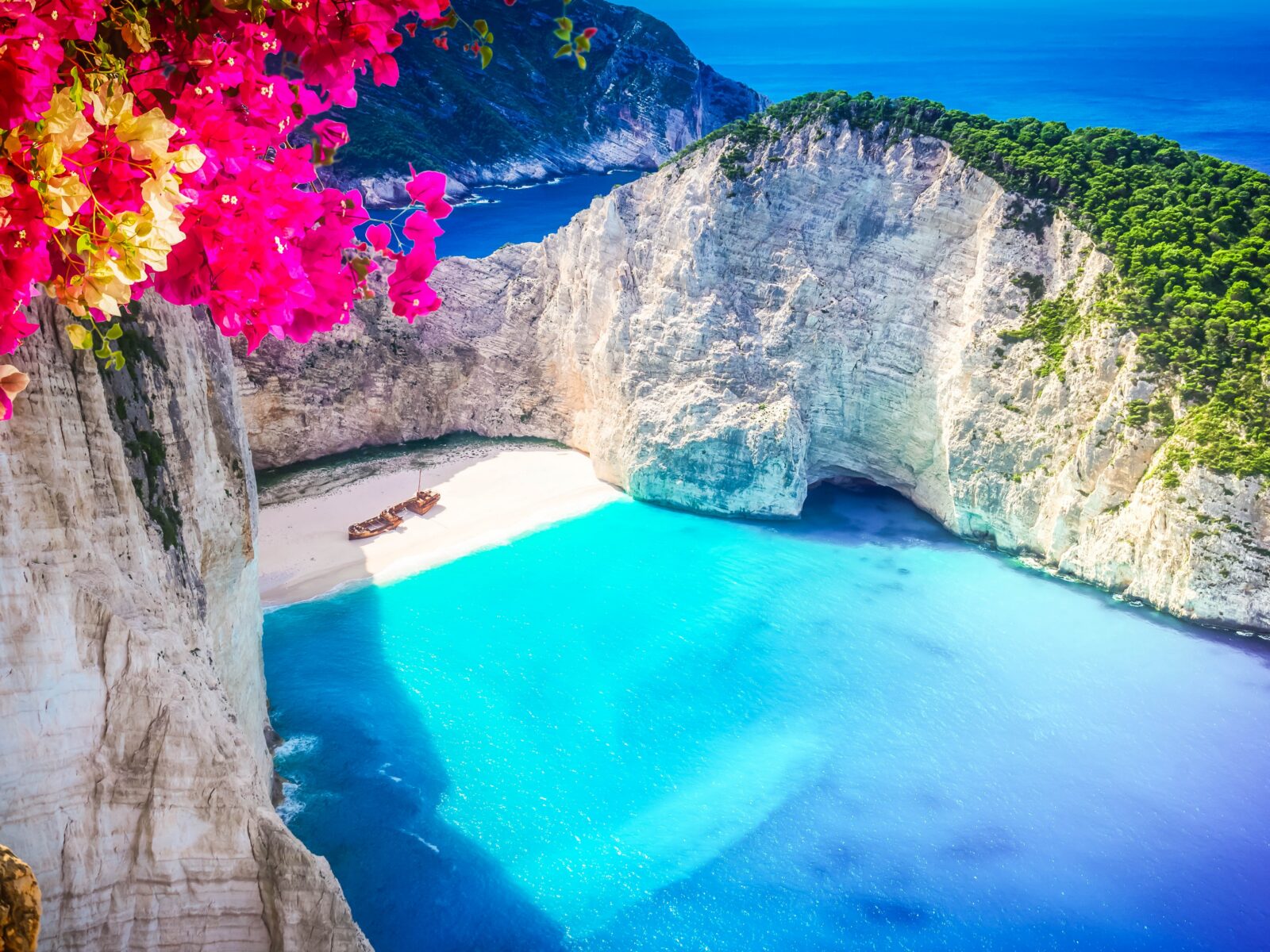 Navagio,Beach,,Famous,Overhead,Lanscape,Of,Zakinthos,Island,With,Flowers,