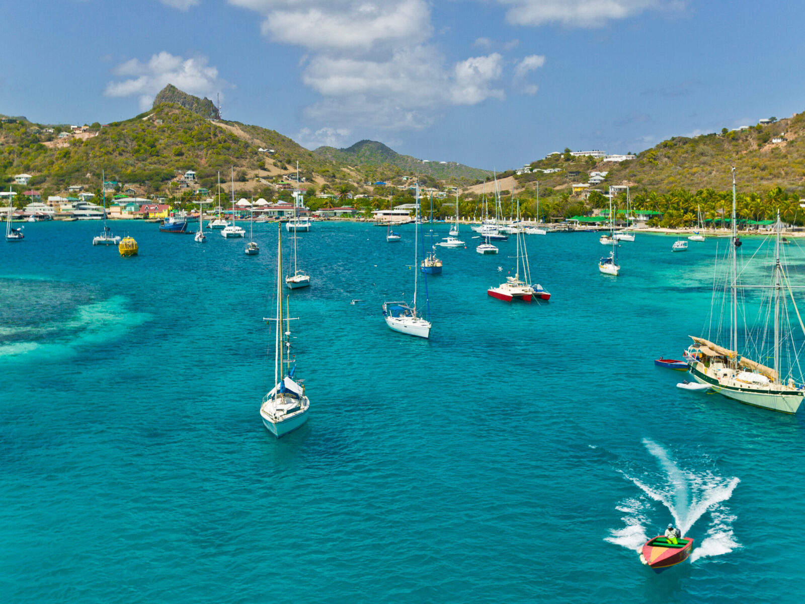 Anchoring,Sailbooats,In,The,Shallow,Waters,Of,Union,Island,st.vincent,And