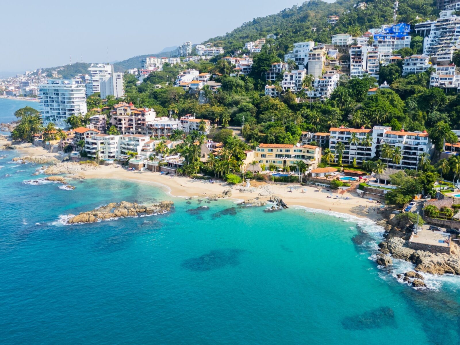 Clear,Water,Beach,On,The,Coast,Of,Mexico,With,Urban
